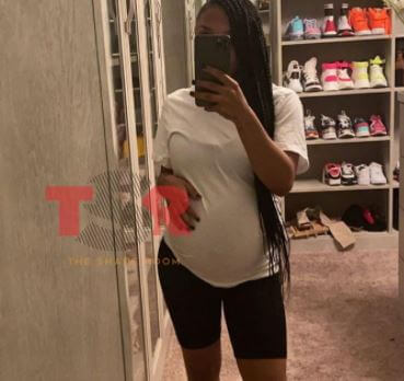 Yaya flaunting baby bump